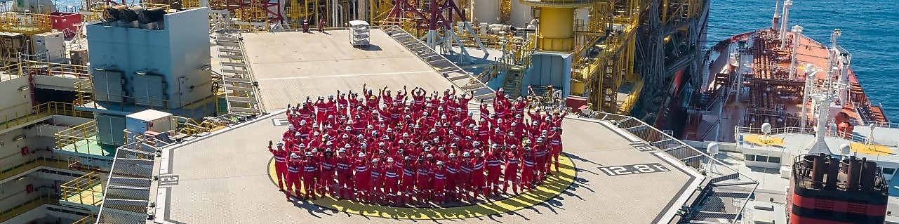 Workman walking up the stairs at a construction site