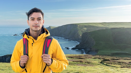 Person standing at sea side area