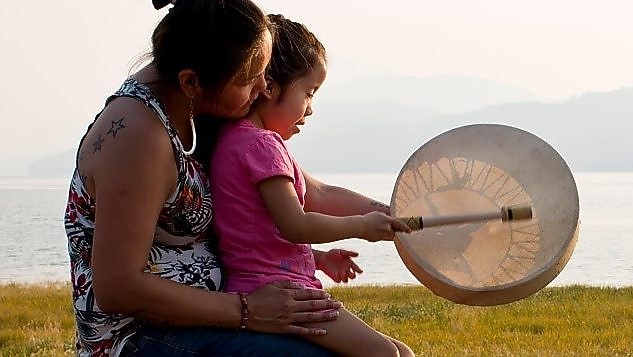 Engaging with Nivkh community members at the traditional Fishermen Day festival on Sakhalin Island
