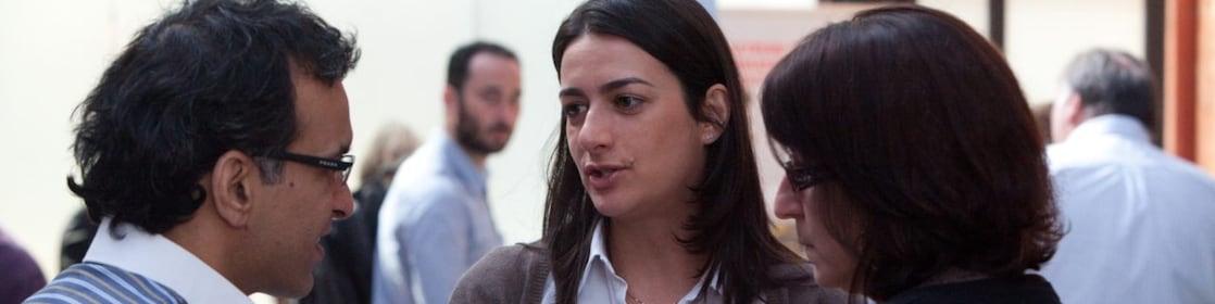 Group standing having a discussion