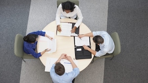 High angle view of business people having meeting.
