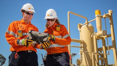 Operations colleagues in a meeting on site