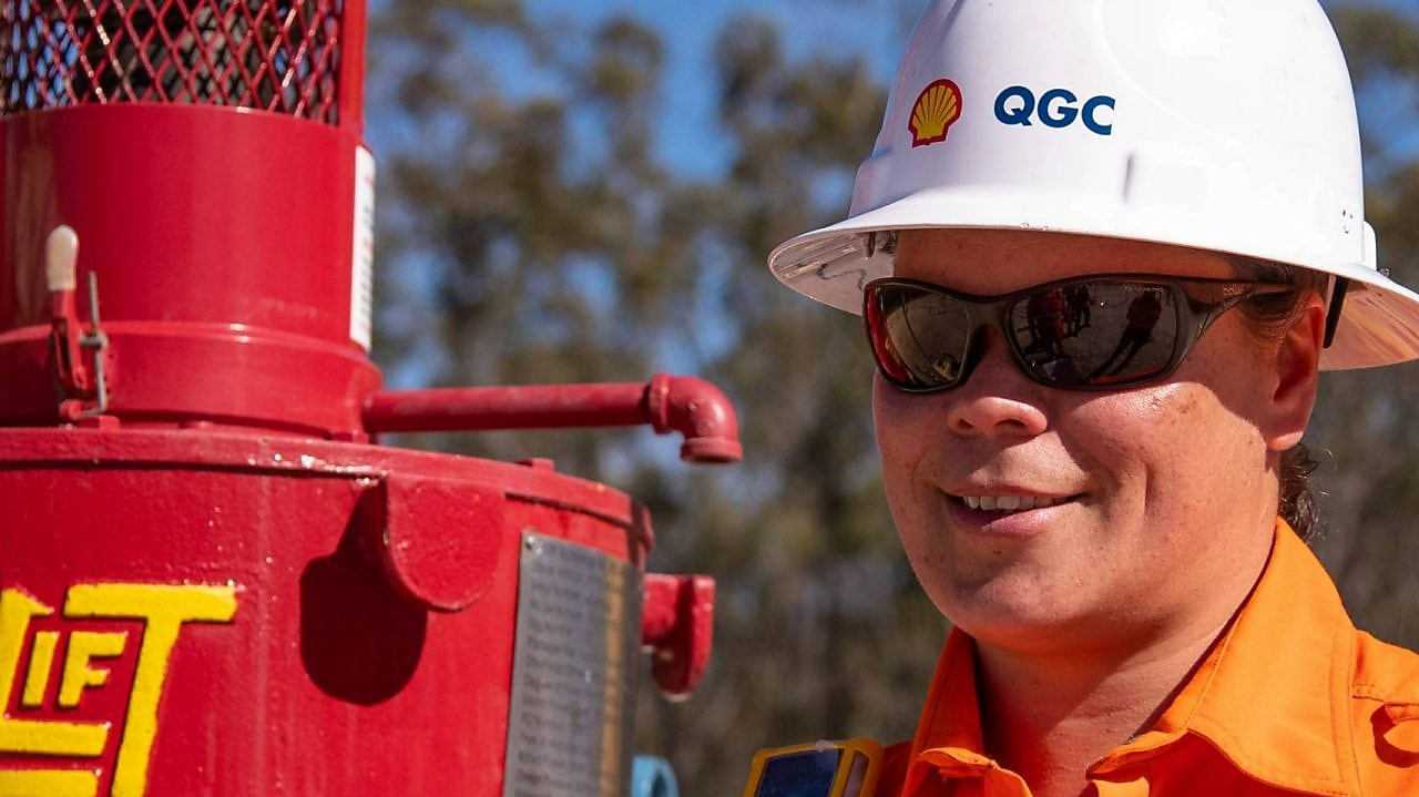 Engineer looking up at platform under construction