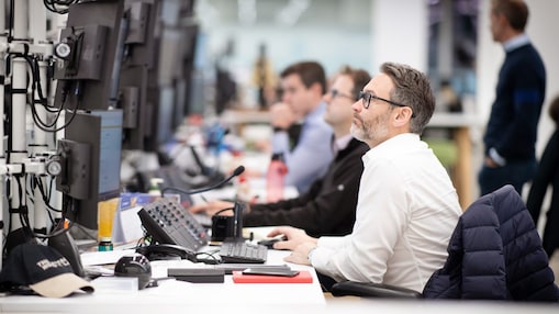 men working in office