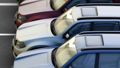 Fleet Cars: Row of parked cars in parking lot