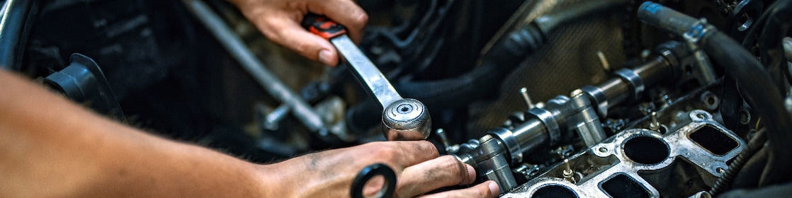 Mechanic repairing car