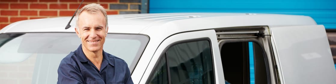Man standing in front of a van
