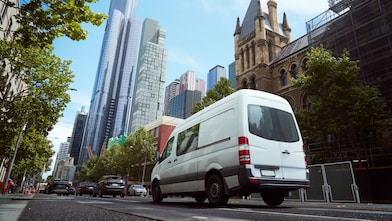 Van driving on a road