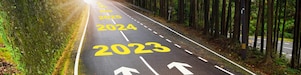Asphalt road surface printed with 2022, 2023 and years ahead
