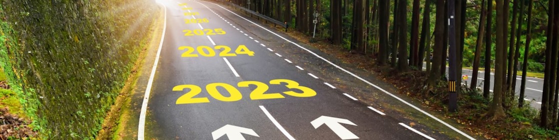 Asphalt road surface printed with 2022, 2023 and years ahead