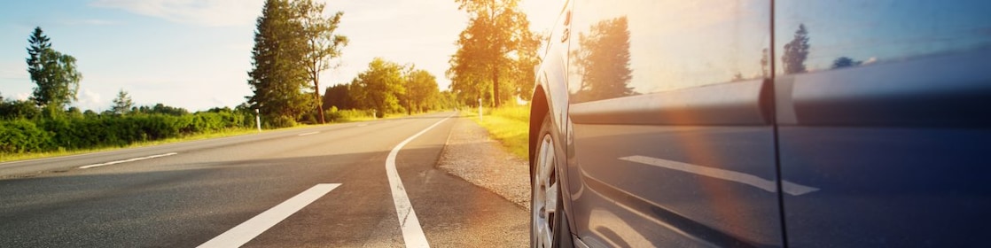 Car pulled up on the side of a road