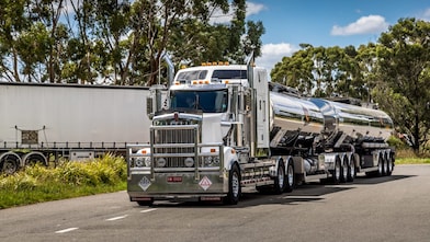 Big truck driving on a country road