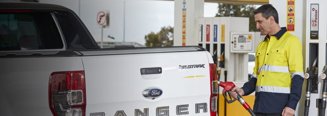 Man fueling the vehicle