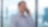 An individual holding a cellphone to his ear