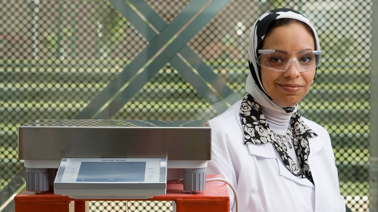 Marwa Al-Ansary wearing safety goggles outside a Shell site