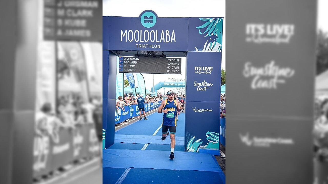 Mitch running in triathlon