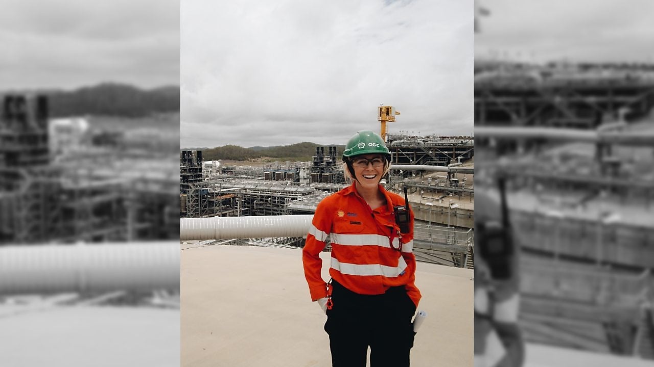 Jacquie in a factory