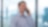 An individual holding a cellphone to his ear