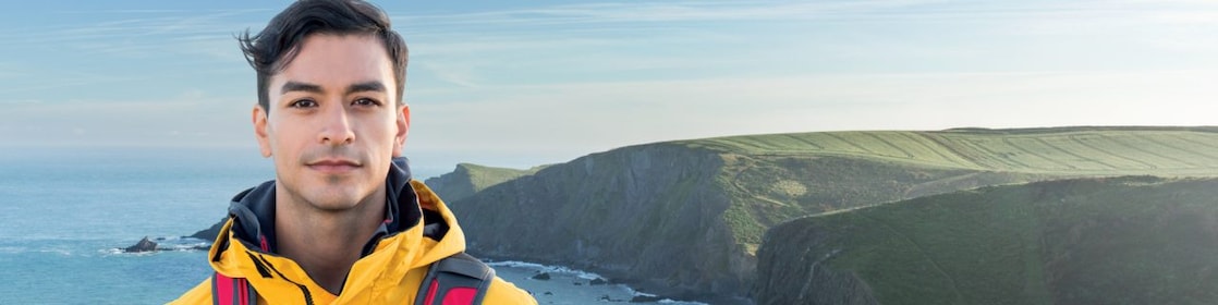 Person standing at sea side area