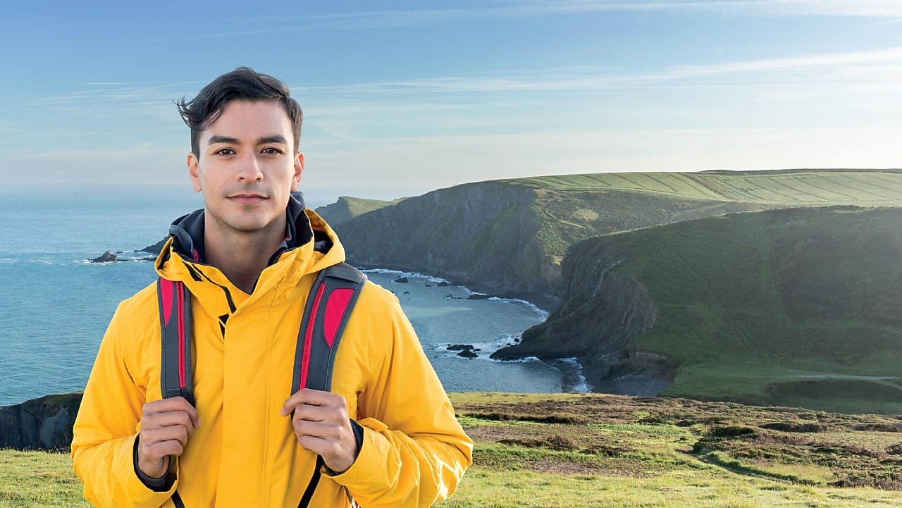 Person standing at sea side area