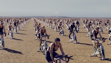 cyclists paddling in desert