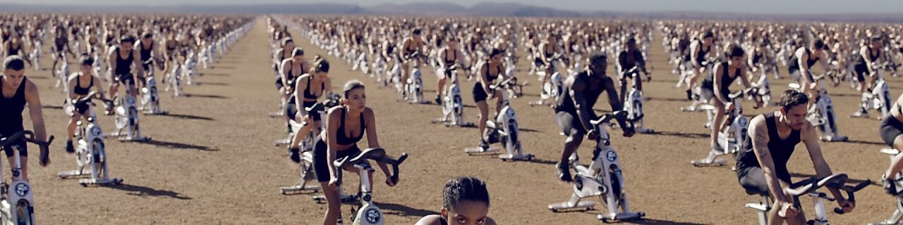 cyclists paddling in desert