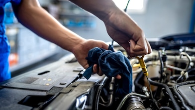 Mechanic working on car
