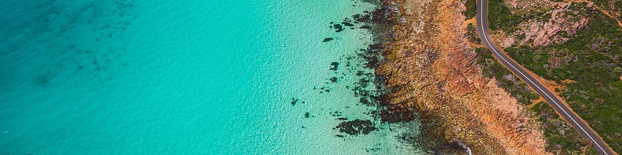 An aerial photo of a coastal road in Dunsborough, WA.