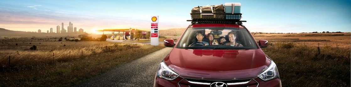 Family in car after filling up with fuel