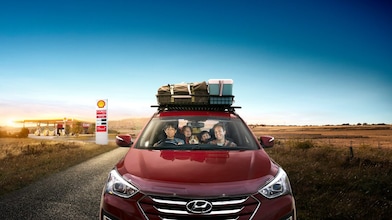 Family in car after filling up with fuel