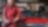 Man sitting on red cars bonnet