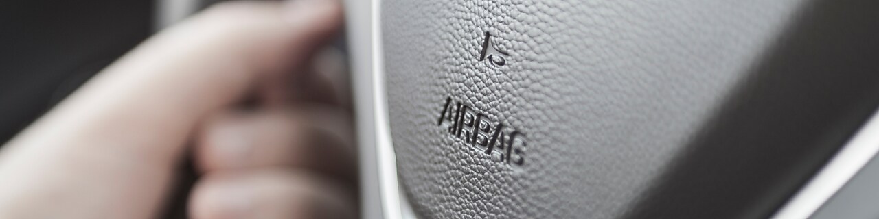 airbag and horn icon on steering wheel