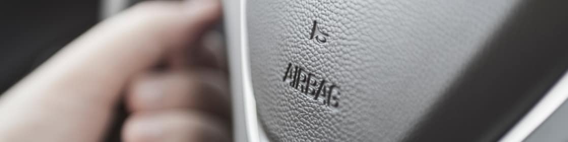 airbag and horn icon on steering wheel