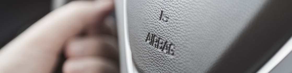 airbag and horn icon on steering wheel