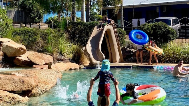 Image of people playing in pool at caravan park