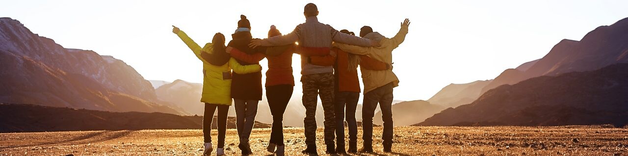 Friend hugging outdoors