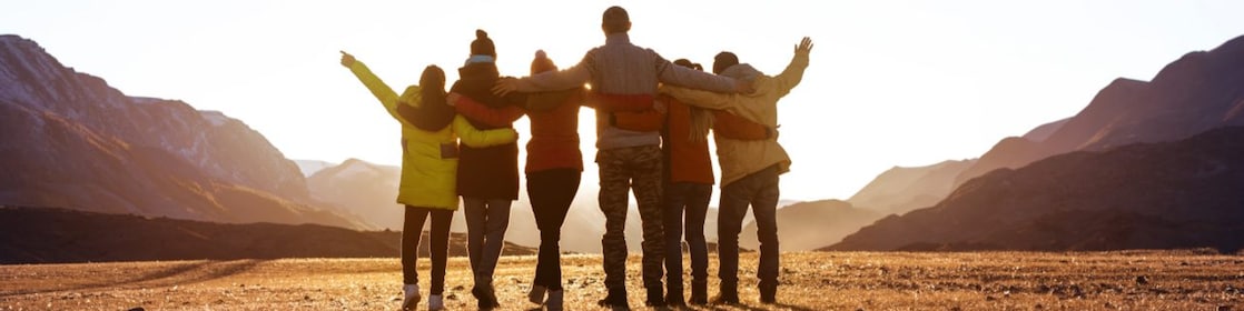 Friend hugging outdoors