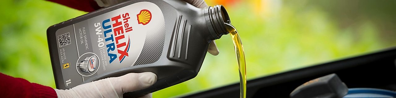 Filling up a car with Shell Helix
