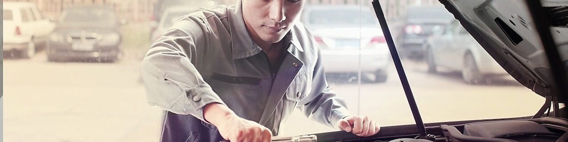 Mechanic fixing a car