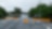 Road in between greenery