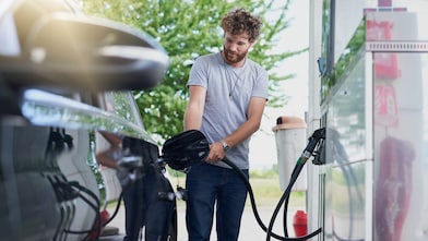 Man at petrol pump