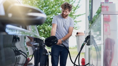 Man filling up with fuel
