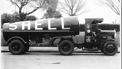 Historic black and white image of a Shell branded truck in Australia