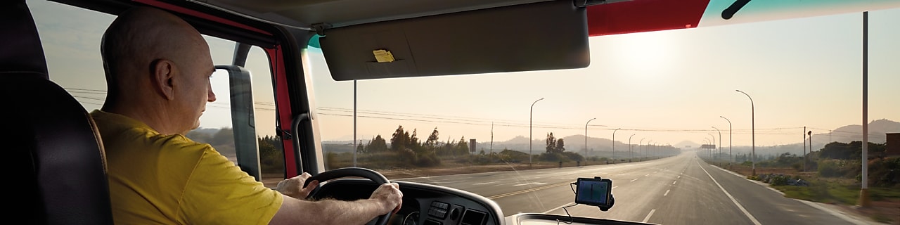 truck driver driving on empty road
