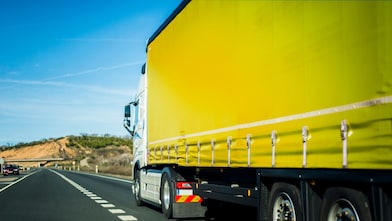 Yellow truck on the road