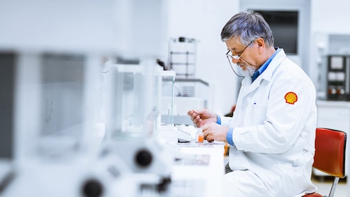 Senior male researcher carrying out scientific research in a lab