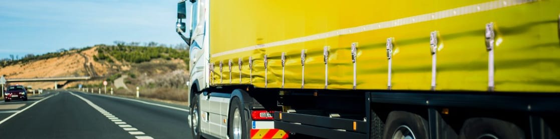 Yellow truck on the road
