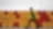 Man walking past barrels of Lubricants