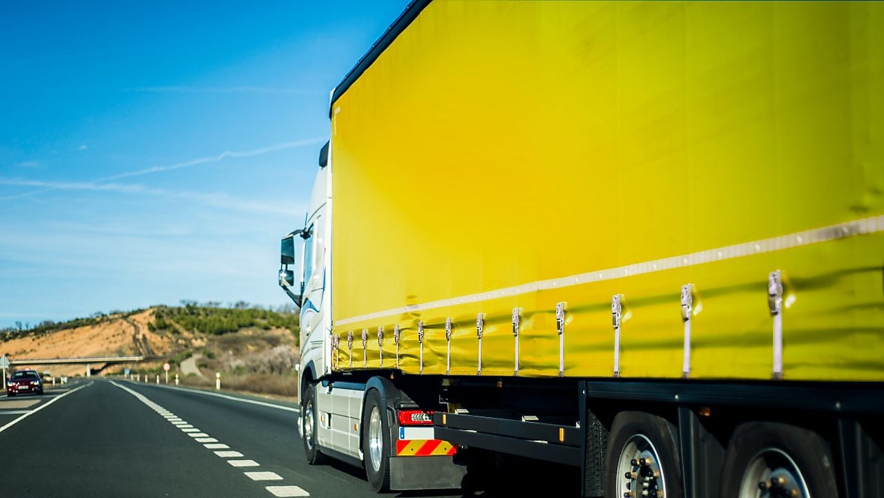 Yellow truck on the road