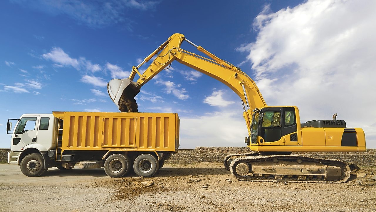 Loading mud in a truck